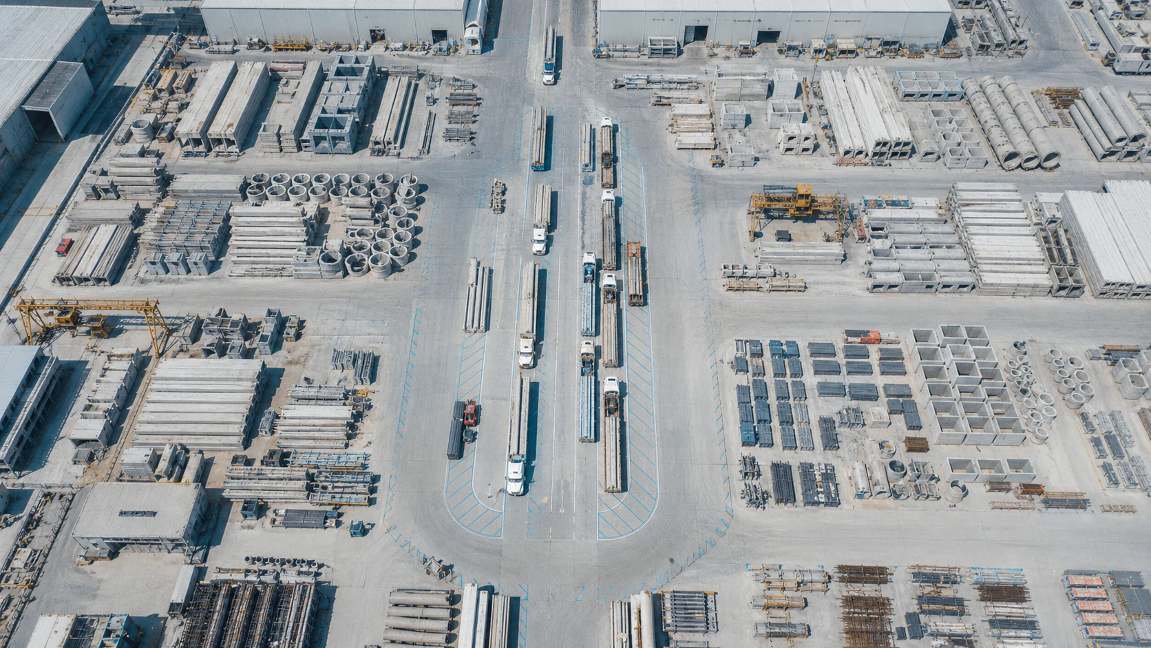 Aerial view of inventory zones converging into one infrastructure products dispatch corridor